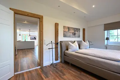 Ein Bett oder Betten in einem Zimmer der Unterkunft Charmante Altbauwohnung mit Flair in Polling
