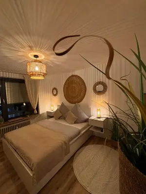 Ein Bett oder Betten in einem Zimmer der Unterkunft Boho City Livings Munich Central Station