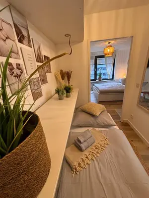 Ein Bett oder Betten in einem Zimmer der Unterkunft Boho City Livings Munich Central Station