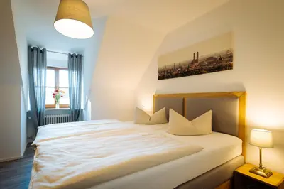 Ein Bett oder Betten in einem Zimmer der Unterkunft Hotel Reiter Bräu