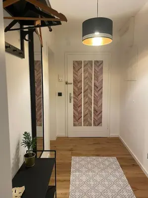 Ein Bett oder Betten in einem Zimmer der Unterkunft Schöne 2 Zimmer Wohnung Kingsize-Bett