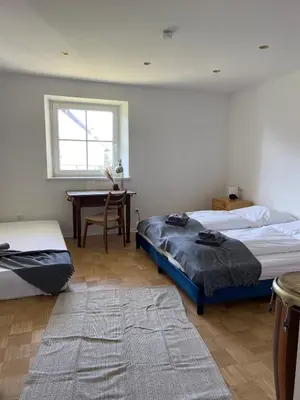 Ein Bett oder Betten in einem Zimmer der Unterkunft Apartment mit 3 Schlafzimmern im Erdgeschoss