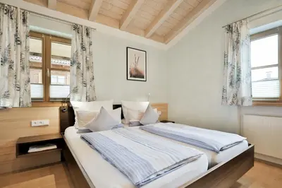 Ein Bett oder Betten in einem Zimmer der Unterkunft Fewo Ammertal