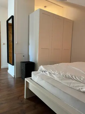 Ein Bett oder Betten in einem Zimmer der Unterkunft Sorglos in Poing - Messe München, Marienplatz, Therme Erding