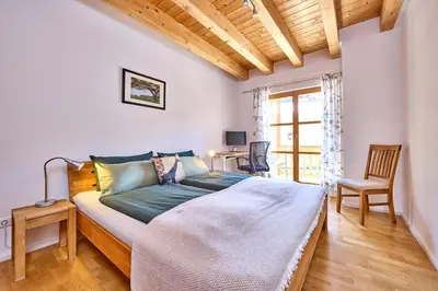 Ein Bett oder Betten in einem Zimmer der Unterkunft Mountain Safari Garmisch - Spacious, scenic and steps from adventure
