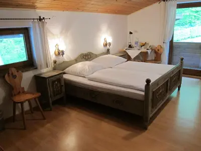 Ein Bett oder Betten in einem Zimmer der Unterkunft Waldgasthof Pension Baodwirt