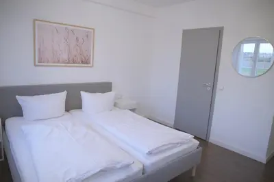Ein Bett oder Betten in einem Zimmer der Unterkunft Hotel & Gasthof Wagner