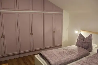 Ein Bett oder Betten in einem Zimmer der Unterkunft tiefkar8 
