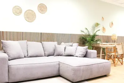 Ein Sitzbereich in der Unterkunft Cozy Trade Fair Apartment Munich