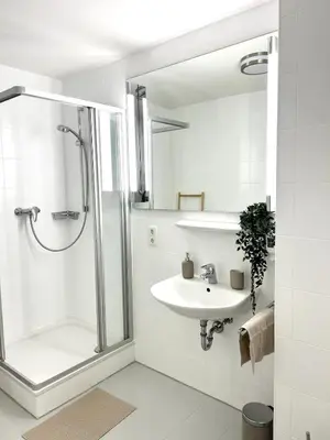 Ein Badezimmer in der Unterkunft Cozy Trade Fair Apartment Munich