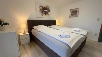 Ein Bett oder Betten in einem Zimmer der Unterkunft Aparmtent im Münchner Westen, Parkplatz kostenfrei, ruhig