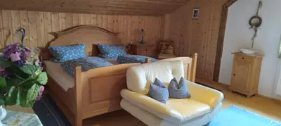 Ein Bett oder Betten in einem Zimmer der Unterkunft Ferienwohnung am Marienbrunnen