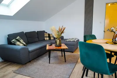 Ein Sitzbereich in der Unterkunft Cozy Apartment near Therme Erding