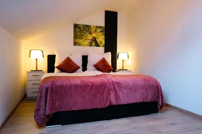 Ein Bett oder Betten in einem Zimmer der Unterkunft Cozy Apartment near Therme Erding