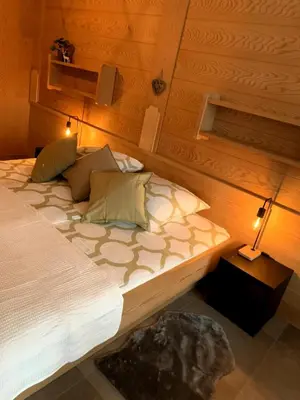 Ein Bett oder Betten in einem Zimmer der Unterkunft Ferienwohnung Seekitz