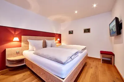 Ein Bett oder Betten in einem Zimmer der Unterkunft Appartements Christiane Knöpfle
