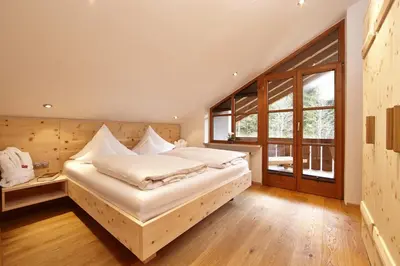 Ein Bett oder Betten in einem Zimmer der Unterkunft Appartements Christiane Knöpfle