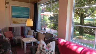Ein Sitzbereich in der Unterkunft Gästehaus Huber - traditional Sixties Hostel
