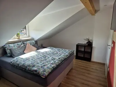 Ein Bett oder Betten in einem Zimmer der Unterkunft Ferienwohnung Mariposa