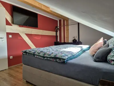 Ein Bett oder Betten in einem Zimmer der Unterkunft Ferienwohnung Mariposa