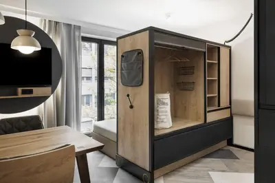 Ein Bett oder Betten in einem Zimmer der Unterkunft Stay KooooK Munich City