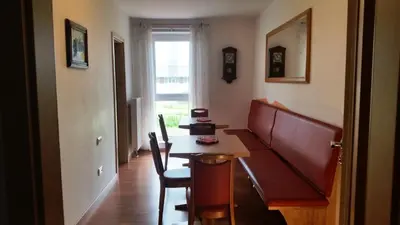 Ein Sitzbereich in der Unterkunft Schirmer`s Hotelino