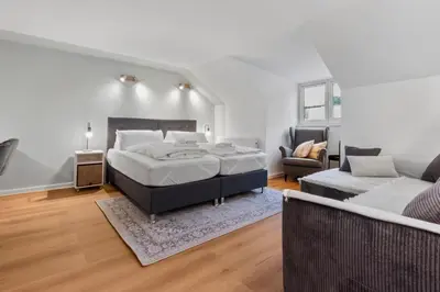 Ein Sitzbereich in der Unterkunft Flatista Homes - Luise
