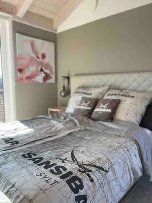 Ein Bett oder Betten in einem Zimmer der Unterkunft Architekten-Villa, moderne 220qm, 4 Schlafzimmer, Garten