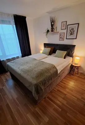 Ein Bett oder Betten in einem Zimmer der Unterkunft Vilnius Apart Suite