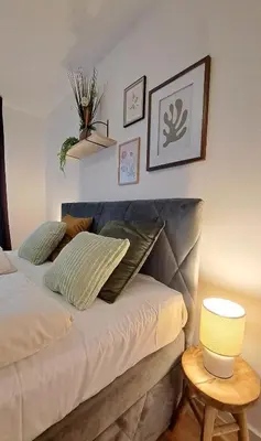 Ein Bett oder Betten in einem Zimmer der Unterkunft Vilnius Apart Suite