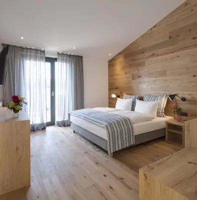 Ein Bett oder Betten in einem Zimmer der Unterkunft Hotel M120