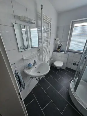 Ein Badezimmer in der Unterkunft City-Appartement am Mühlbach-Kurpark