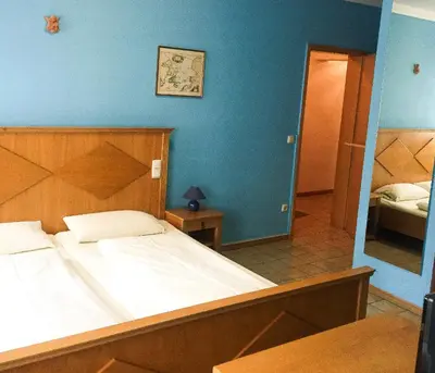Ein Bett oder Betten in einem Zimmer der Unterkunft Pension Mona Lisa