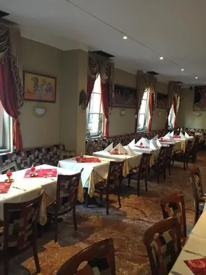 Ein Restaurant oder anderes Speiselokal in der Unterkunft Pension Mona Lisa