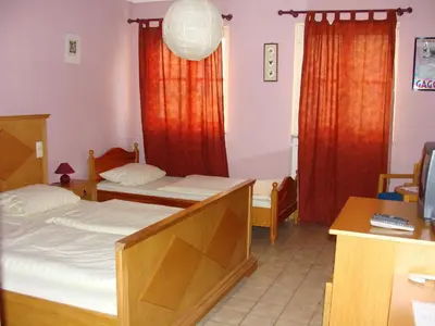 Ein Bett oder Betten in einem Zimmer der Unterkunft Pension Mona Lisa
