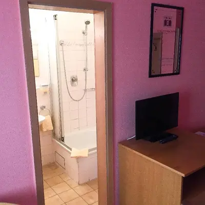 Ein Badezimmer in der Unterkunft Pension Mona Lisa
