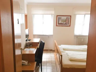 Ein Bett oder Betten in einem Zimmer der Unterkunft Pension Mona Lisa