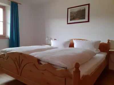 Ein Bett oder Betten in einem Zimmer der Unterkunft Ferienwohnung Andre