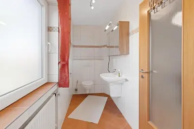 Ein Badezimmer in der Unterkunft Ferienhaus Lescop
