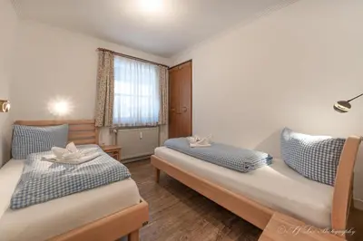 Ein Bett oder Betten in einem Zimmer der Unterkunft Fewo Strasser