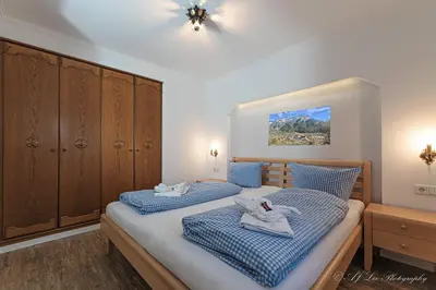 Ein Bett oder Betten in einem Zimmer der Unterkunft Fewo Strasser