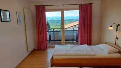 Ein Bett oder Betten in einem Zimmer der Unterkunft Fewo Alpenpanorama