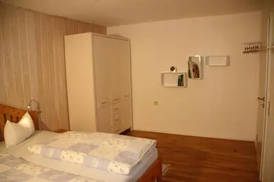 Ein Bett oder Betten in einem Zimmer der Unterkunft Fewo Alpenpanorama