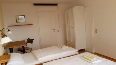 Ein Bett oder Betten in einem Zimmer der Unterkunft Fewo Alpenpanorama