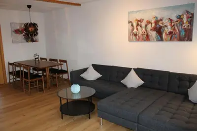 Ein Sitzbereich in der Unterkunft Ferienhaus Nr 112, Kategorie Komfort, Feriendorf Hochbergle, Allgäu