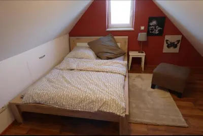 Ein Bett oder Betten in einem Zimmer der Unterkunft Dorfliebe Reicherstein