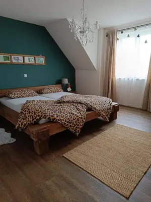 Ein Bett oder Betten in einem Zimmer der Unterkunft Dorfliebe Reicherstein