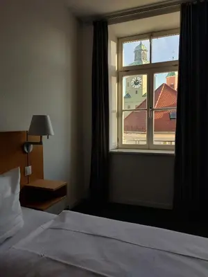 Ein Bett oder Betten in einem Zimmer der Unterkunft Pension Cafe Konrad
