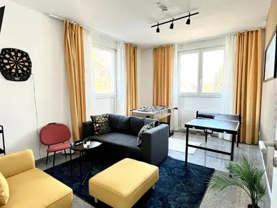 Ein Sitzbereich in der Unterkunft LTA Apartment München Süd No1 Fun & Games