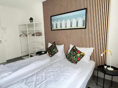 Ein Bett oder Betten in einem Zimmer der Unterkunft LTA Apartment München Süd No1 Fun & Games